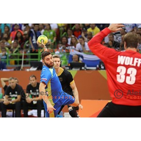 Blaz Janc of Slovenia in action during Olympic handball tournament match between Slovenia and Germany in Barra Olympic Park at Rio de Janeiro 2016 Olympic games , Brazil on August 13 , 2016