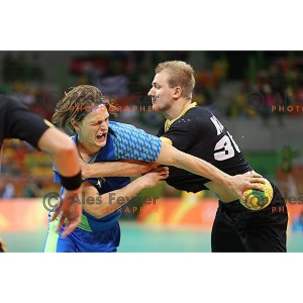 Jure Dolenec of Slovenia in action during Olympic handball tournament match between Slovenia and Germany in Barra Olympic Park at Rio de Janeiro 2016 Olympic games , Brazil on August 13 , 2016