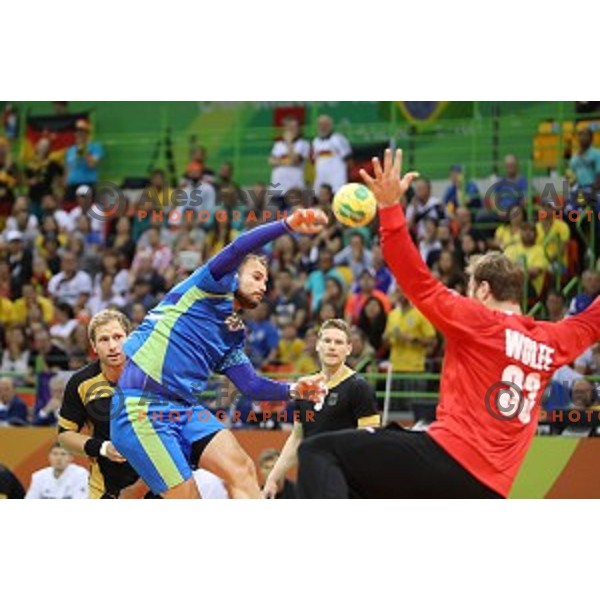 Uros Zorman of Slovenia in action during Olympic handball tournament match between Slovenia and Germany in Barra Olympic Park at Rio de Janeiro 2016 Olympic games , Brazil on August 13 , 2016