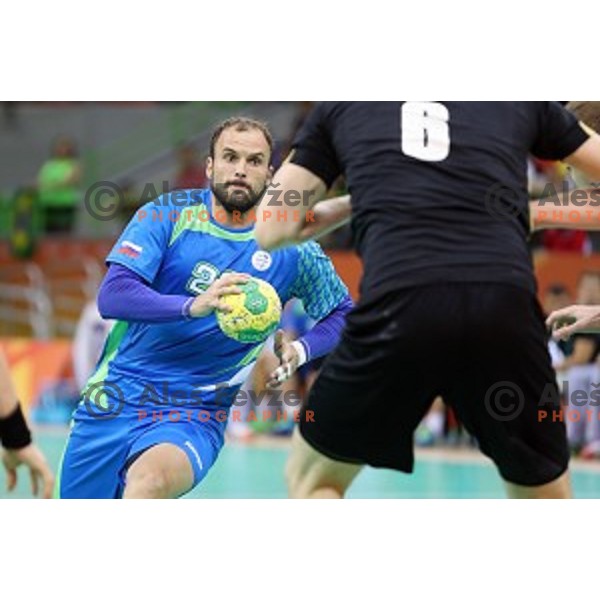 Uros Zorman of Slovenia in action during Olympic handball tournament match between Slovenia and Germany in Barra Olympic Park at Rio de Janeiro 2016 Olympic games , Brazil on August 13 , 2016