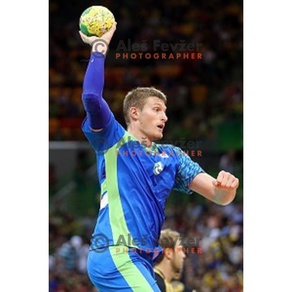 Blaz Blagotinsek of Slovenia in action during Olympic handball tournament match between Slovenia and Germany in Barra Olympic Park at Rio de Janeiro 2016 Olympic games , Brazil on August 13 , 2016