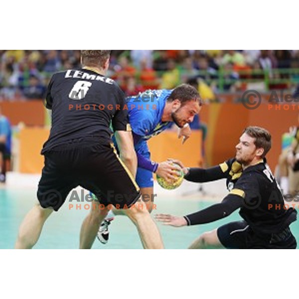 Uros Zorman of Slovenia in action during Olympic handball tournament match between Slovenia and Germany in Barra Olympic Park at Rio de Janeiro 2016 Olympic games , Brazil on August 13 , 2016