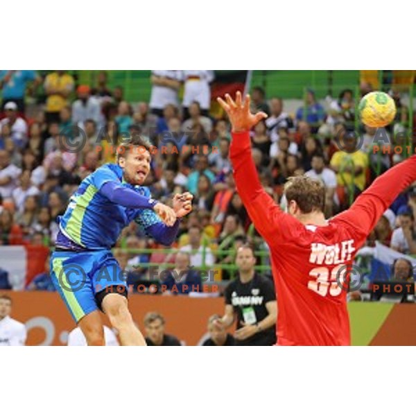 Marko Bezjak of Slovenia in action during Olympic handball tournament match between Slovenia and Germany in Barra Olympic Park at Rio de Janeiro 2016 Olympic games , Brazil on August 13 , 2016