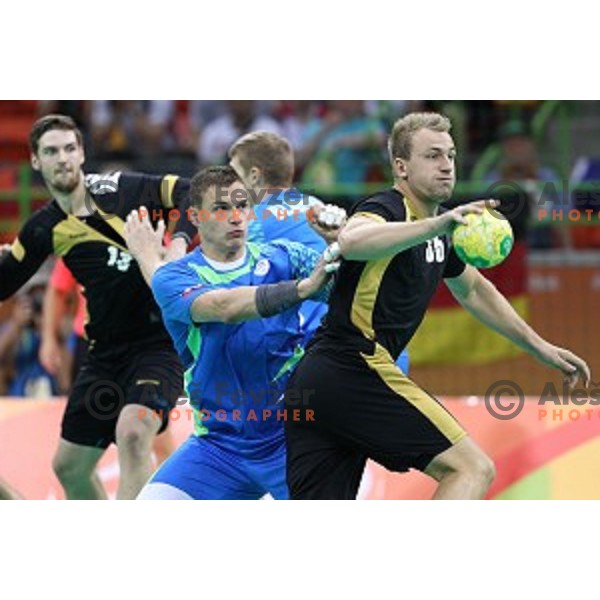 Vid Poteko of Slovenia in action during Olympic handball tournament match between Slovenia and Germany in Barra Olympic Park at Rio de Janeiro 2016 Olympic games , Brazil on August 13 , 2016