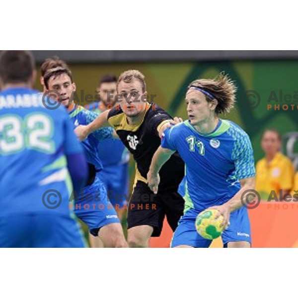 Jure Dolenec of Slovenia in action during Olympic handball tournament match between Slovenia and Germany in Barra Olympic Park at Rio de Janeiro 2016 Olympic games , Brazil on August 13 , 2016