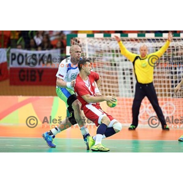 Matej Gaber of Slovenia in action during Olympic handball tournament match between Slovenia and Poland in Barra Olympic Park at Rio de Janeiro 2016 Olympic games , Brazil on August 15 , 2016