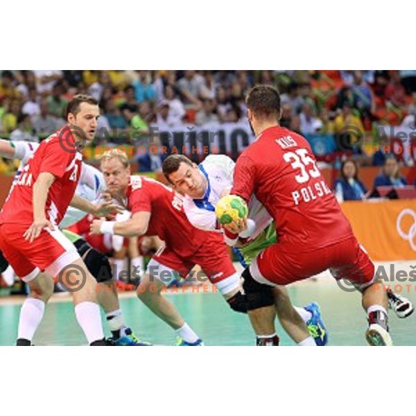 Miha Zarabec of Slovenia in action during Olympic handball tournament match between Slovenia and Poland in Barra Olympic Park at Rio de Janeiro 2016 Olympic games , Brazil on August 15 , 2016