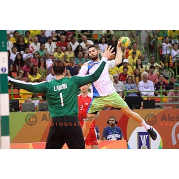 Blaz Janc of Slovenia in action during quarter-final of Olympic handball tournament match between Slovenia and Denmark in Barra Olympic Park at Rio de Janeiro 2016 Olympic games , Brazil on August 17 , 2016