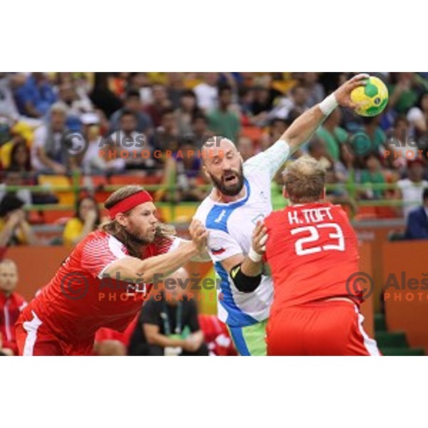 Vid Kavticnik of Slovenia in action during quarter-final of Olympic handball tournament match between Slovenia and Denmark in Barra Olympic Park at Rio de Janeiro 2016 Olympic games , Brazil on August 17 , 2016