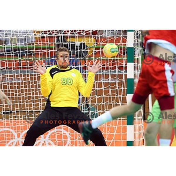 Urban Lesjak of Slovenia in action during quarter-final of Olympic handball tournament match between Slovenia and Denmark in Barra Olympic Park at Rio de Janeiro 2016 Olympic games , Brazil on August 17 , 2016