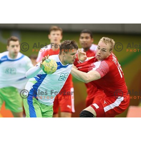 Marko Bezjak of Slovenia in action during quarter-final of Olympic handball tournament match between Slovenia and Denmark in Barra Olympic Park at Rio de Janeiro 2016 Olympic games , Brazil on August 17 , 2016