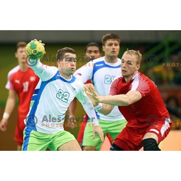 Miha Zarabec of Slovenia in action during quarter-final of Olympic handball tournament match between Slovenia and Denmark in Barra Olympic Park at Rio de Janeiro 2016 Olympic games , Brazil on August 17 , 2016