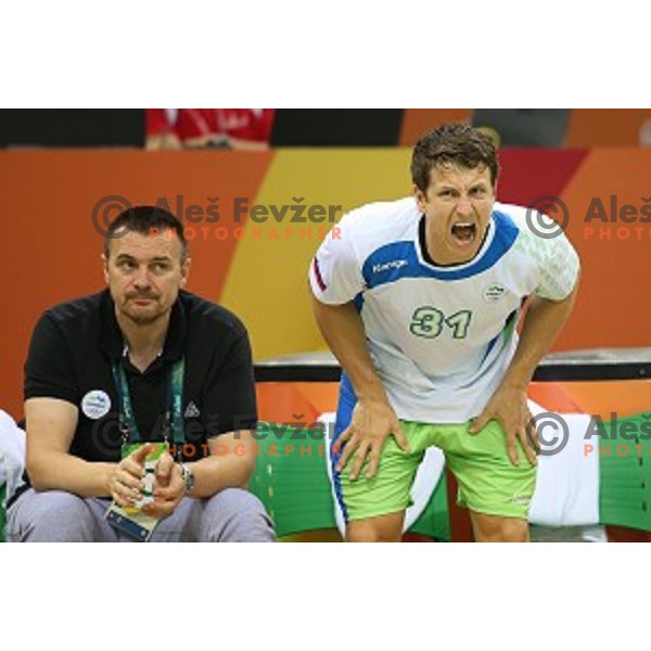 Simon Razgor of Slovenia in action during quarter-final of Olympic handball tournament match between Slovenia and Denmark in Barra Olympic Park at Rio de Janeiro 2016 Olympic games , Brazil on August 17 , 2016