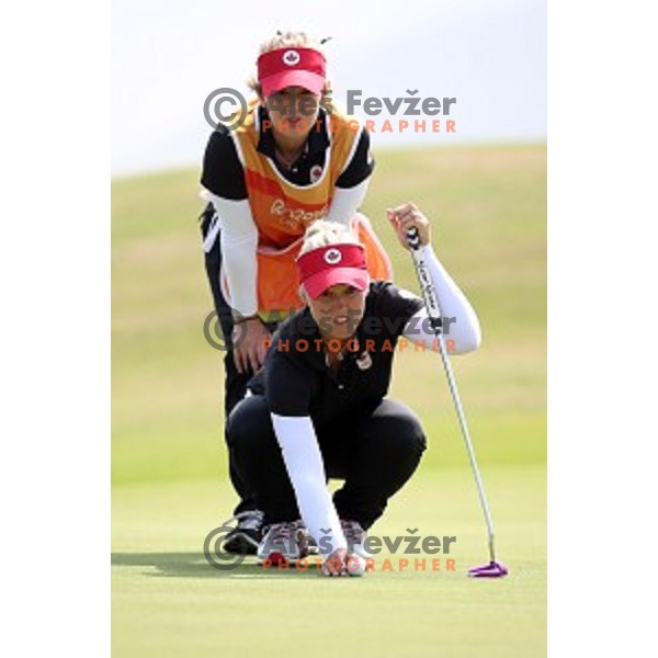 Brooke Henderson (CAN) in action during third round of Women\'s Olympic golf tournament at Barra Golf course during Rio de Janeiro 2016 Olympic games , Brazil on August 19 , 2016