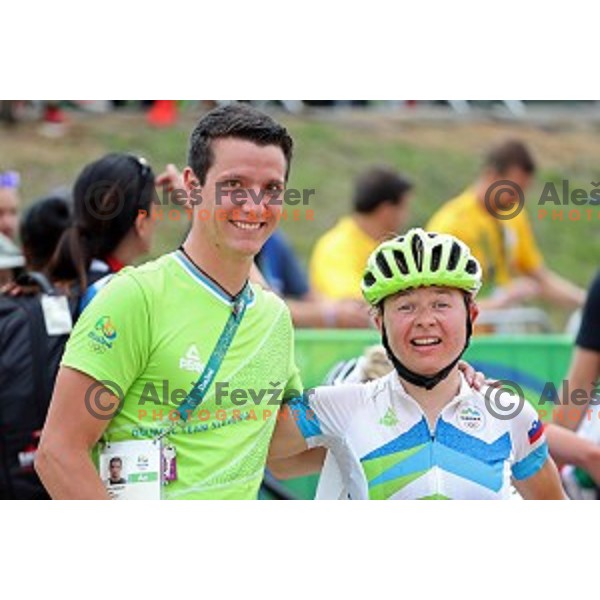 Urban Ferencak and Tanja Zakelj of Slovenia at the finish of Women\'s Cross-Country race at Deodoro Mountain Bike Centre during Rio de Janeiro 2016 Olympic games , Brazil on August 20 , 2016