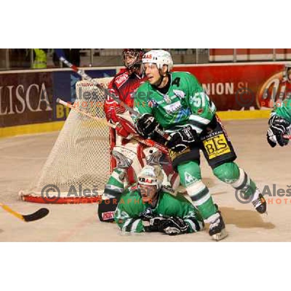 Jardine (12), Corupe (51) at Ice-hockey game ZM Olimpija-Acroni Jesenice in EBEL league played in Ljubljana,Slovenia 7.10.2007. Photo by Ales Fevzer 