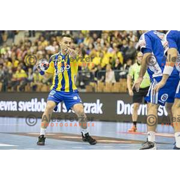 Celje’s left wing and captain Luka Zvizej (77) in action during EHF Champions League match between Celje PL (Slovenia) and MOL-Pick Szeged (Hungary) in Zlatorog Hall, Celje on November 12th, 2016