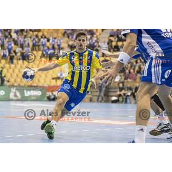 Celje’s centre back David Razgor (9) in action during EHF Champions League match between Celje PL (Slovenia) and MOL-Pick Szeged (Hungary) in Zlatorog Hall, Celje on November 12th, 2016