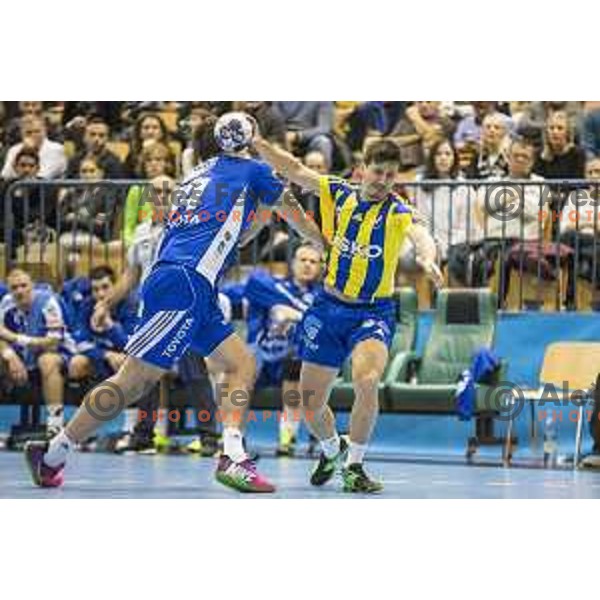 Celje’s centre back David Razgor (9) in action during EHF Champions League match between Celje PL (Slovenia) and MOL-Pick Szeged (Hungary) in Zlatorog Hall, Celje on November 12th, 2016