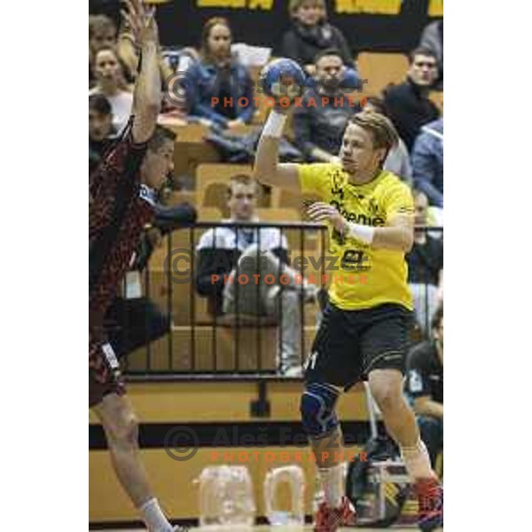 Gorenje’s left wing Janez Gams (31) in action during EHF Cup playoff match between Gorenje Velenje and Fuchse Berlin (Germany) in Red Hall, Celje on November 23th, 2016
