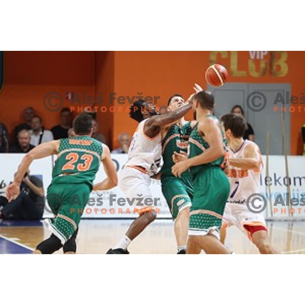 Cory Remekun of Helios suns and Gasper Vidmar of Banvit in action during BBL Champions League basketball match between Helios Suns (Slovenia) and Banvit (Turkey) in Domzale Sports Hall, Slovenia on November 23, 2016