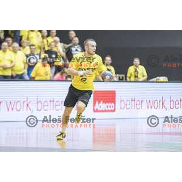 Gorenje’s left wing Niko Medved (5) in action during EHF Cup playoff match between Gorenje Velenje and Fuchse Berlin (Germany) in Red Hall, Celje on November 23th, 2016
