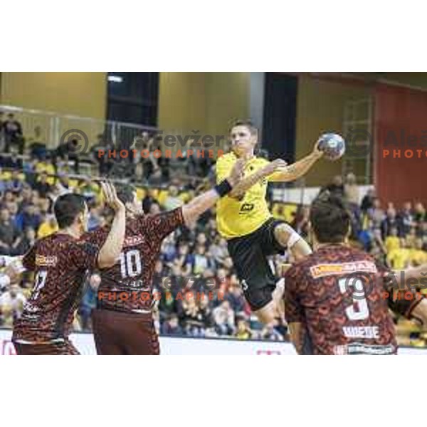 Gorenje’s right wing Rok Golcar (23) in action during EHF Cup playoff match between Gorenje Velenje and Fuchse Berlin (Germany) in Red Hall, Celje on November 23th, 2016