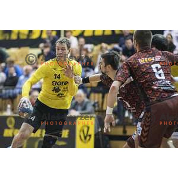 Gorenje’s left back Vid Levc (14) in action during EHF Cup playoff match between Gorenje Velenje and Fuchse Berlin (Germany) in Red Hall, Celje on November 23th, 2016