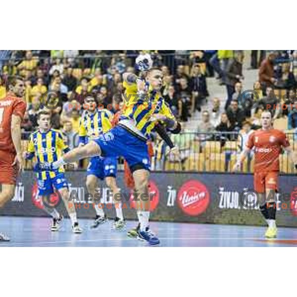 Celje’s line player Vid Poteko (15) in action during EHF Champions League match between Celje PL (Slovenia) and Meshkov Brest (Belarus) in Zlatorog Hall, Celje on November 27th, 2016