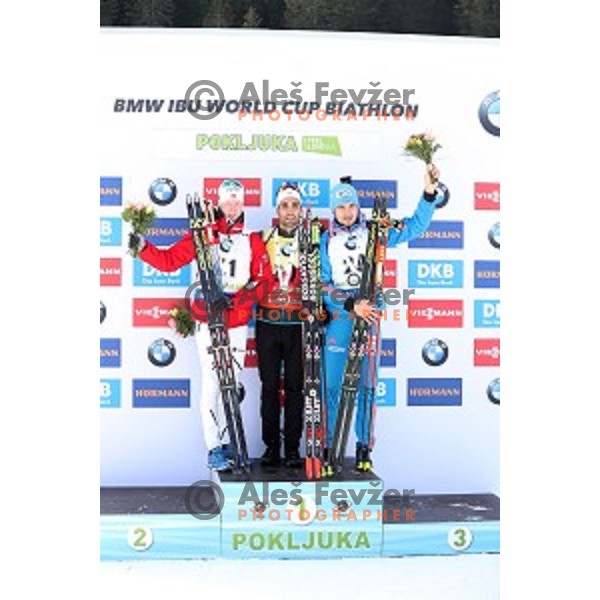 Johannes Boe (NOR), Martin Fourcade (FRA), winner of Men\'s 10 km Sprint and Anton Shipulin (RUS) during IBU World Cup 2016/2017 Pokljuka, Slovenia on December 9, 0216