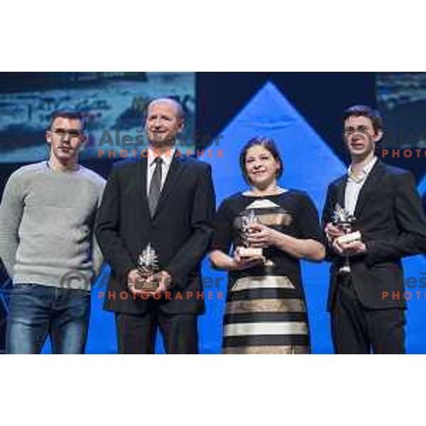 Nik Pem and Nik Zupancic of Slovenia ice hockey team, Tina Trstenjak , winner of Slovenian sportswoman of the year 2016 award and Peter Prevc, winner of Slovenian sportsman of the year 2016 award during Gala night in Cankar Hall, Ljubljana, Slovenia on December 13, 2016