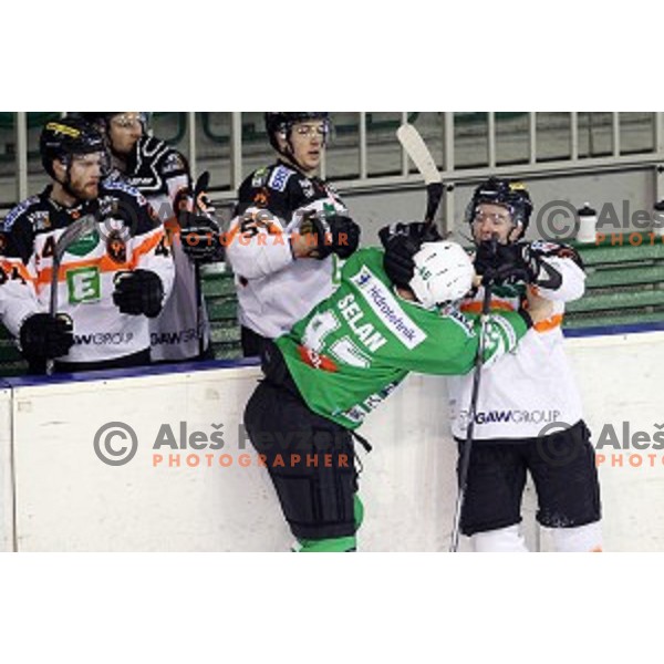 Ken Ograjensek of Graz and Maks Selan of Olimpija Ljubljana fights during ice-hockey match between Olimpija Ljubljana and Graz Moser Medical 99ers in EBEL league 2016/2017 in Tivoli Hall, Ljubljana, Slovenia on January 29, 2017