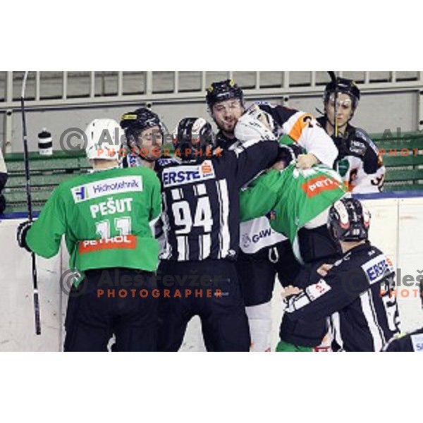 Ken Ograjensek of Graz and Maks Selan of Olimpija Ljubljana fights during ice-hockey match between Olimpija Ljubljana and Graz Moser Medical 99ers in EBEL league 2016/2017 in Tivoli Hall, Ljubljana, Slovenia on January 29, 2017