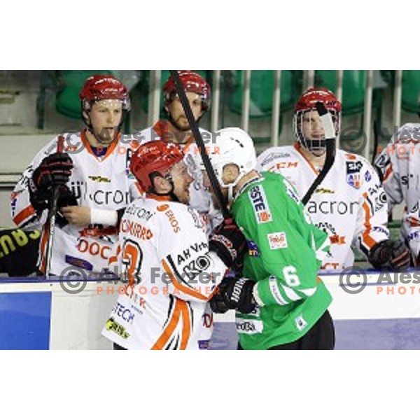 Nate Di Casmirro of Jesenice and Bostjan Groznik of Olimpija in action during ice-hockey match between Olimpija Ljubljana and Jesenice in the Final of Slovenian league 2016/2017 in Tivoli Hall, Ljubljana, Slovenia on April 6, 2017