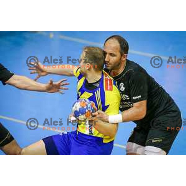 Ziga Mlakar of Celje vs Alem Toskic of Gorenje Velenje in action during handball match between Celje PL - Gorenje Velenje, semi final Slovenia cup match 2016/17, played in Dvorana Tabor, Maribor, Slovenia on April 15, 2017