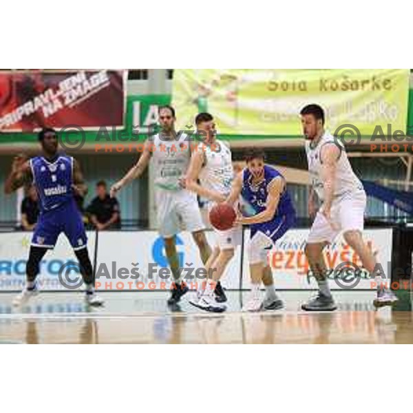 Tadej Ferme of Rogaska and Nejc Baric, Matej Krusic of Zlatorog Lasko in action during semi-final of Nova KBM league basketball match between Zlatorog Lasko and Rogaska in Tri Lilije Hall, Lasko, Slovenia on May 10, 2017