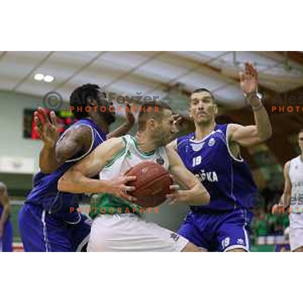 Ramo Rizvic of Zlatorog Lasko and Taylor Johns, Dragisa Drobnjak of Rogaska in action during semi-final of Nova KBM league basketball match between Zlatorog Lasko and Rogaska in Tri Lilije Hall, Lasko, Slovenia on May 10, 2017