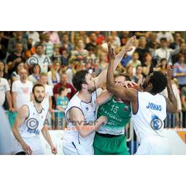 Dragan Duranovic and Maurice Johns Taylor of Rogaska vs Milos Miljkovic of Zlatorog Lasko in action during basketball match between KK Rogaska - Zlatorog Lasko of Nova KBM league 2016/17, played at Sports hall Rogaska Slatina, Slovenia on May 12, 2017