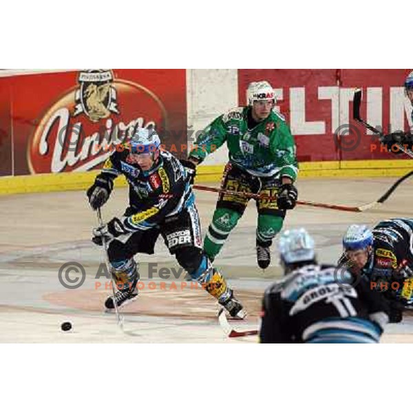 Perthaler (30) and Tavzelj (44) at match ZM Olimpija- Linz in Ebel league,played in Ljubljana (Slovenia) 23.11.2007. Photo by Ales Fevzer 