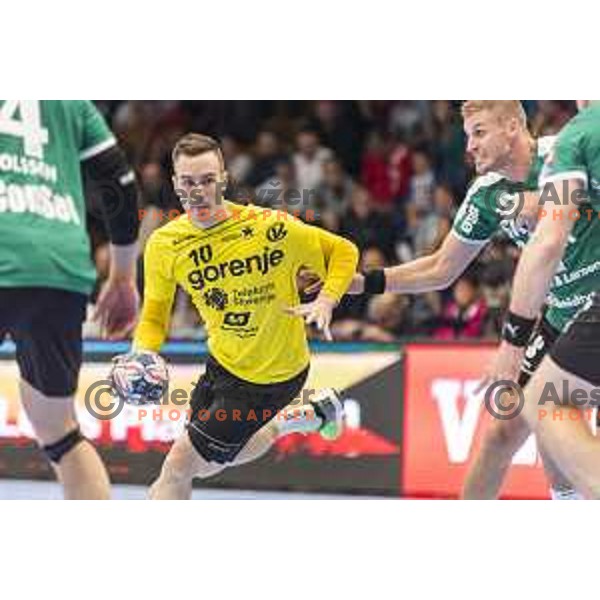 Gorenje’s Rok Ovnicek (10) in action during EHF Champions League match between Gorenje Velenje and Skjern Handbold, in Red Hall, Velenje on October 1st, 2017 