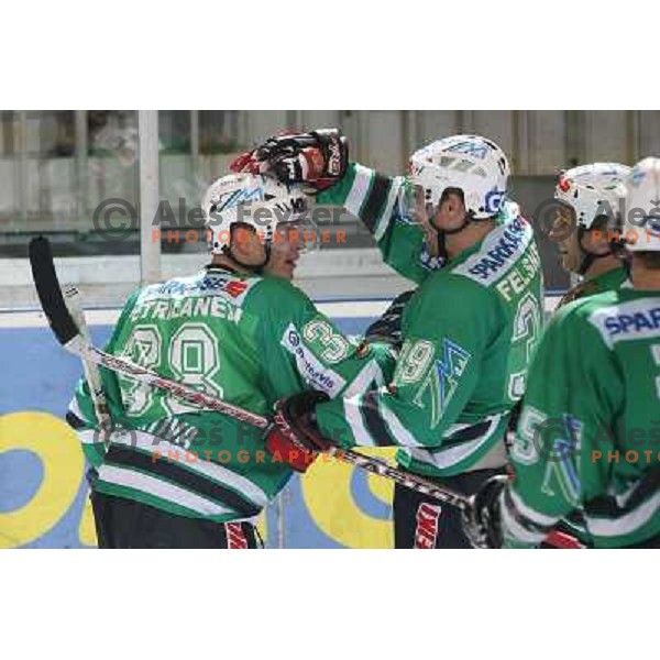 Petrilainen and Felsner celebrate winning goal at ice-hockey match ZM Olimpija-Vienna Capitals in Ebel league, played in Ljubljana, Slovenia 7.12.2007. Photo by Ales Fevzer 