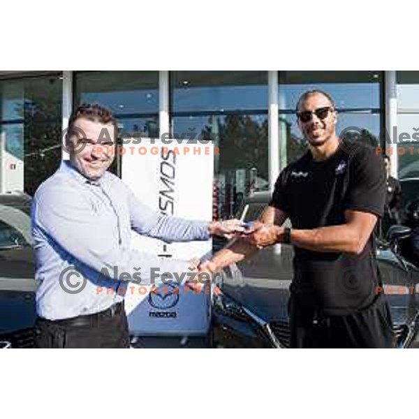 Players of Petrol Olimpija receiving keys of Mazda cars in A-Cosmos shop in Ljubljana, Slovenia on October 13, 2017