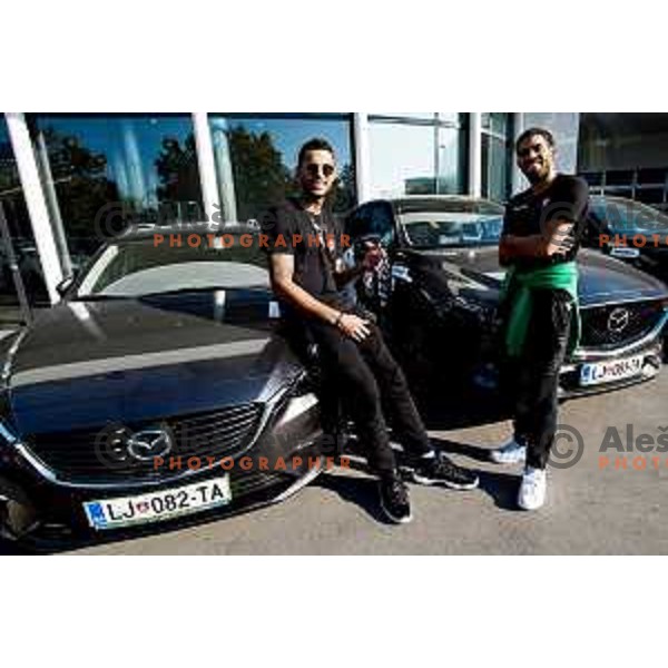 Players of Petrol Olimpija receiving keys of Mazda cars in A-Cosmos shop in Ljubljana, Slovenia on October 13, 2017
