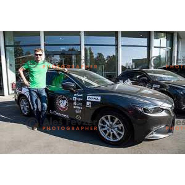 Gasper Okorn of Petrol Olimpija receives keys of Mazda cars in A-Cosmos shop in Ljubljana, Slovenia on October 13, 2017