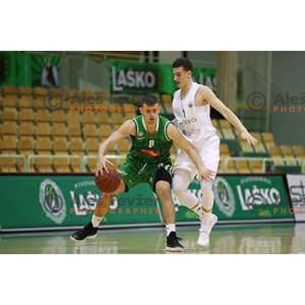 Roko Badzim and Nejc Baric in action during Nova KBM league basketball match between Zlatorog Lasko and Petrol Olimpija in Tri Lilije Hall, Lasko, Slovenia on October 27 ,2017