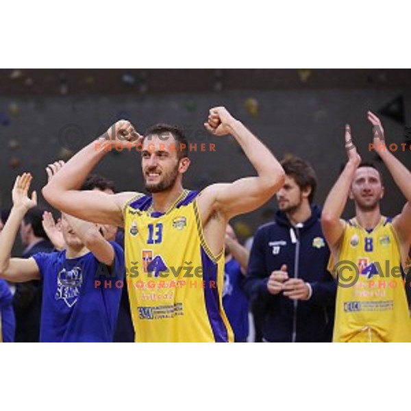 Smiljan Pavic of Sencur GGD celebrates victory at Nova KBM league basketball match between Sencur GGD and Petrol Olimpija in Sencur Sports Hall, Slovenia on November 10, 2017