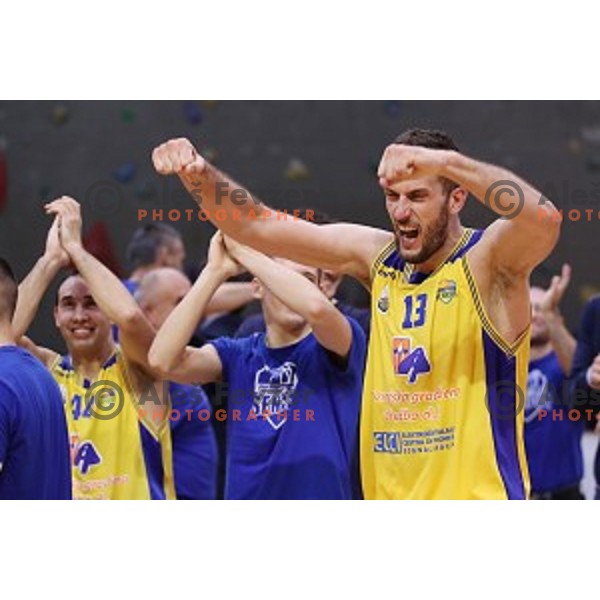 Smiljan Pavic of Sencur GGD celebrates victory at Nova KBM league basketball match between Sencur GGD and Petrol Olimpija in Sencur Sports Hall, Slovenia on November 10, 2017