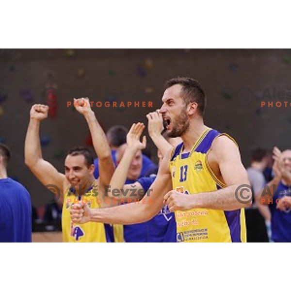 Smiljan Pavic of Sencur GGD celebrates victory at Nova KBM league basketball match between Sencur GGD and Petrol Olimpija in Sencur Sports Hall, Slovenia on November 10, 2017