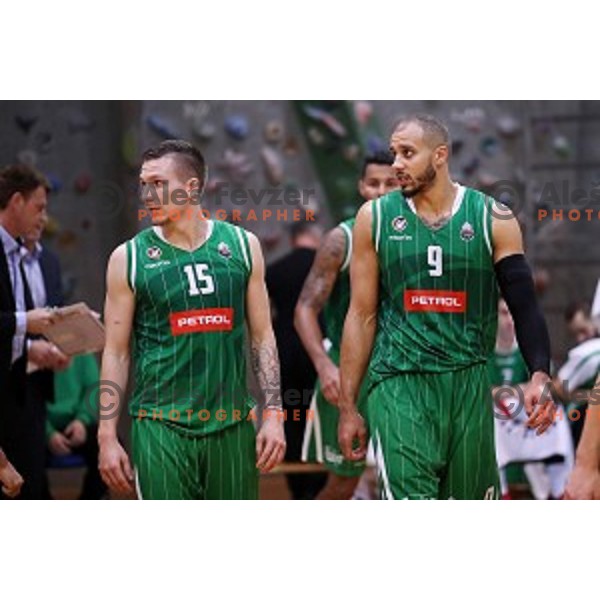 Grgor Hrovat and Jordan Morgan in action during Nova KBM league basketball match between Sencur GGD and Petrol Olimpija in Sencur Sports Hall, Slovenia on November 10, 2017