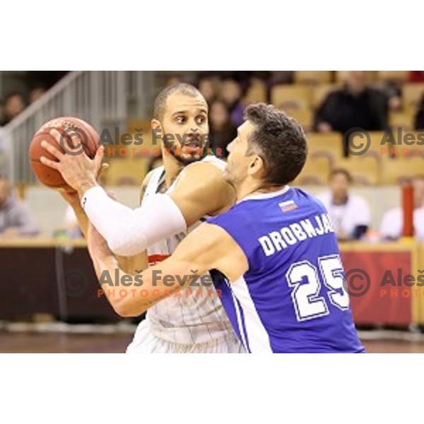 Jordan Morgan and Dragisa Drobnjak in action during Nova KBM league basketball match between Petrol Olimpija and Rogaska in Tivoli Hall, Ljubljana, Slovenia on December 1, 2017